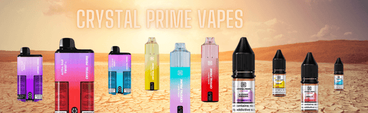 Crystal Prime Vapes products displayed on a cracked desert ground background with a bright sky, featuring colorful disposable vapes and e-liquid bottles, and 'CRYSTAL PRIME VAPES' written at the top.