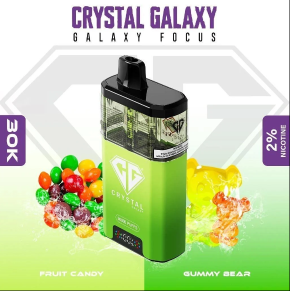 A disposable Crystal Galaxy vape with a gradient green finish, a black mouthpiece, 30K puffs, nicotine, and flavour graphics for Fruit Candy and Gummy Bear.